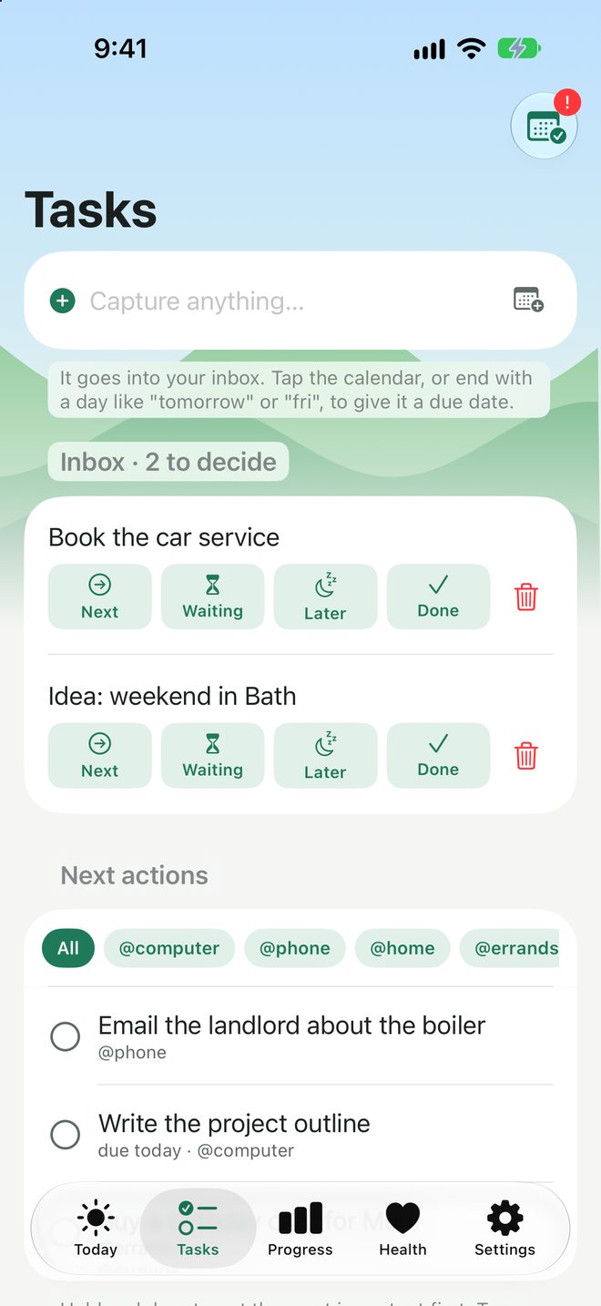 The Tasks screen with a capture box, an inbox to decide and next actions by context